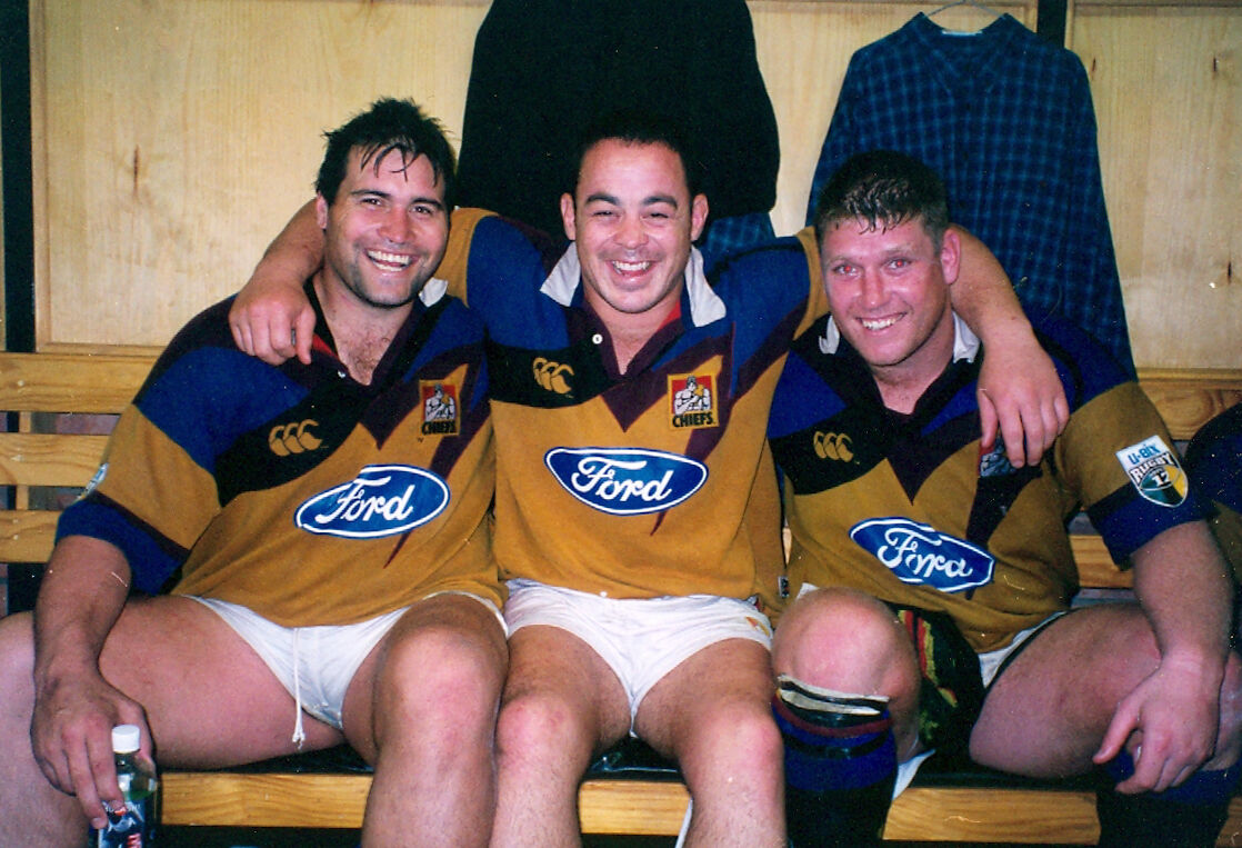Chiefs teammates share a moment in the changing room after a match.