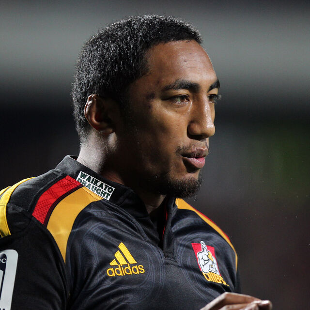 Chiefs player looks determined during a Super Rugby game, representing strength and pride.